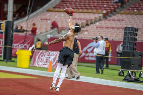 USC Trojans wide receiver Amon-Ra St. Brown #8 catching a pass warming up  for the Colorado Buffaloes vs USC Trojans PAC-12 football game at the Los  Angeles Memorial Coliseum on Saturday October