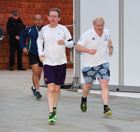 Boris Johnson. Foreign Sec. And Rt Hon Boris Johnson Mp (r) Goes Jogging With Tony Gallagher (l). - Conservative Party Conference At Manchester Central Convention Centre Greater Manchester.