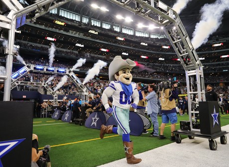 Rowdy, the Dallas Cowboys mascot is displayed on the large video