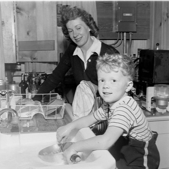 Child Helping His Mother Wash Dishes Editorial Stock Photo Stock