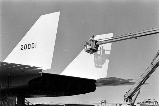 Man Riding Crane On B70 Airplane Editorial Stock Photo - Stock Image ...