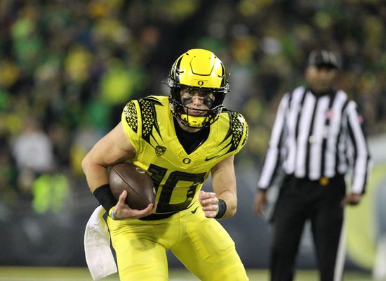 November 12 2022: Oregon Ducks quarterback Bo Nix (10)scores a touchdown in  the second quarter to tie the game at 10-10 as the Oregon Ducks and the  Washington Huskies battle at Autzen