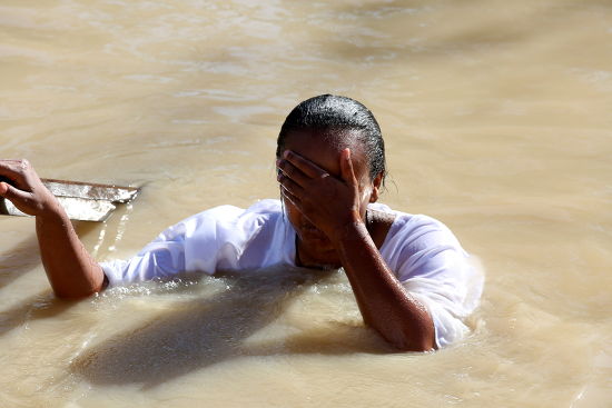 ethiopian-christian-pilgrim-performs-baptism-qasr-editorial-stock-photo