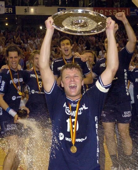 Flensburghandwitts Captain Soeren Stryger Holds Champions Editorial