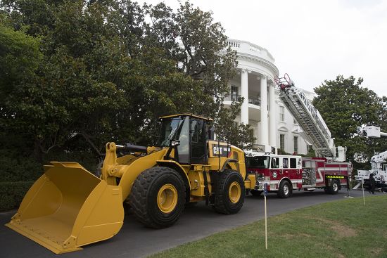 Wheel Loader Firetruck Among Items On Editorial Stock Photo - Stock ...