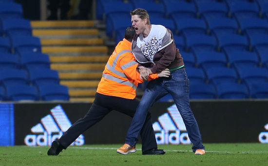 Pitch Invader Taken Down By Steward Editorial Stock Photo Stock Image Pitch Invader Taken Down By Steward Editorial Stock Photo Stock Image