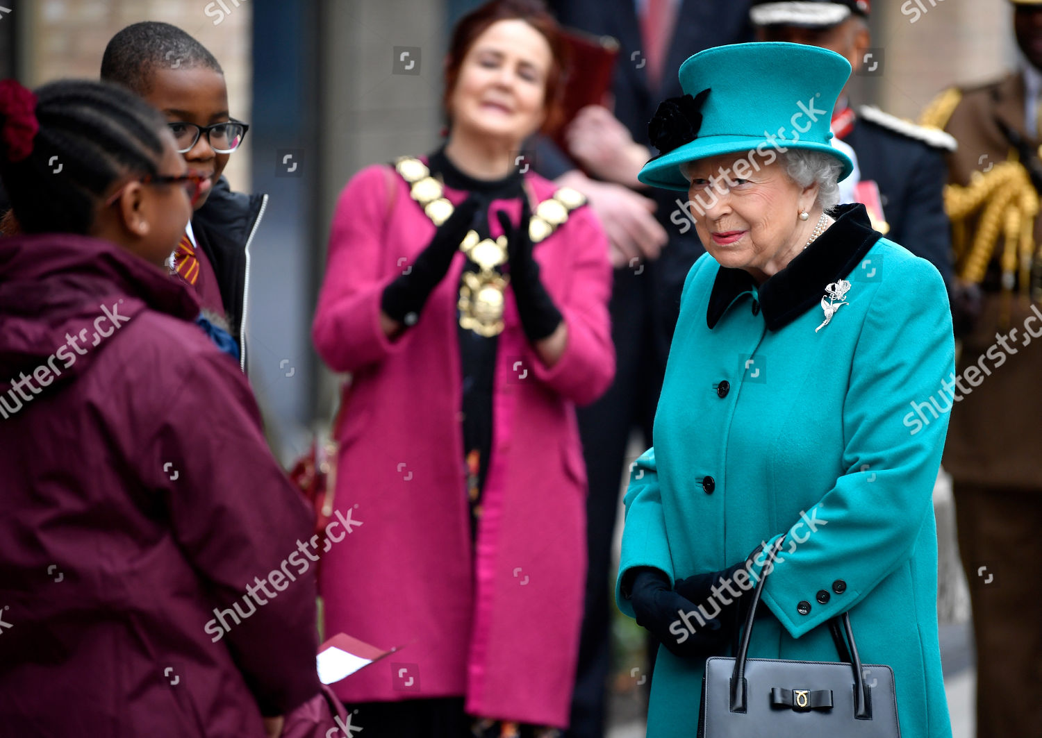 queen-elizabeth-ii-visit-to-coram-s-london-campus-uk-shutterstock-editorial-10014242am.jpg