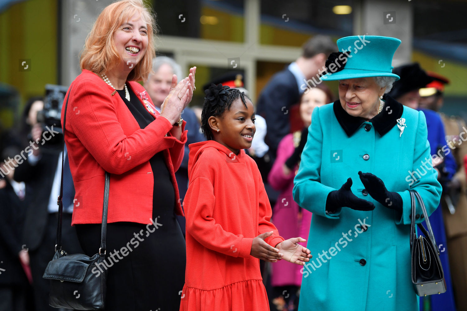 queen-elizabeth-ii-visit-to-coram-s-london-campus-uk-shutterstock-editorial-10014242aw.jpg