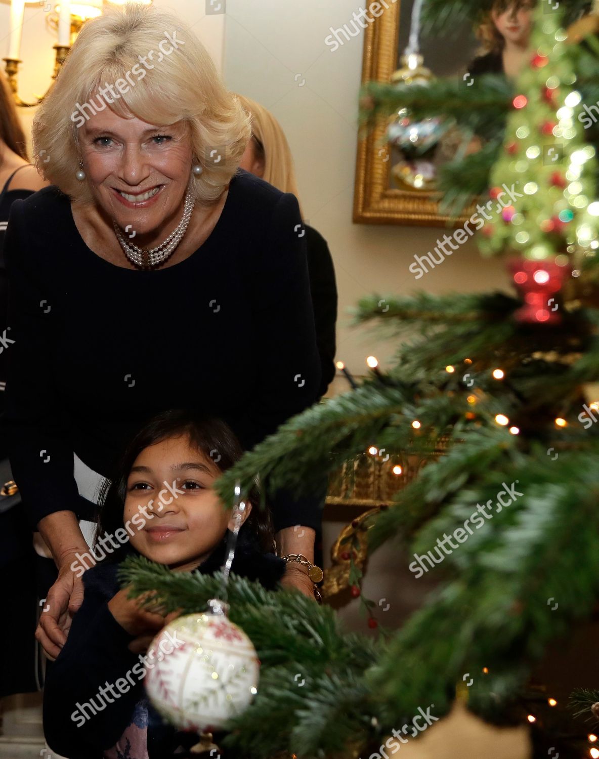 children-attend-a-christmas-event-at-clarence-house-london-uk-shutterstock-editorial-10015343d.jpg