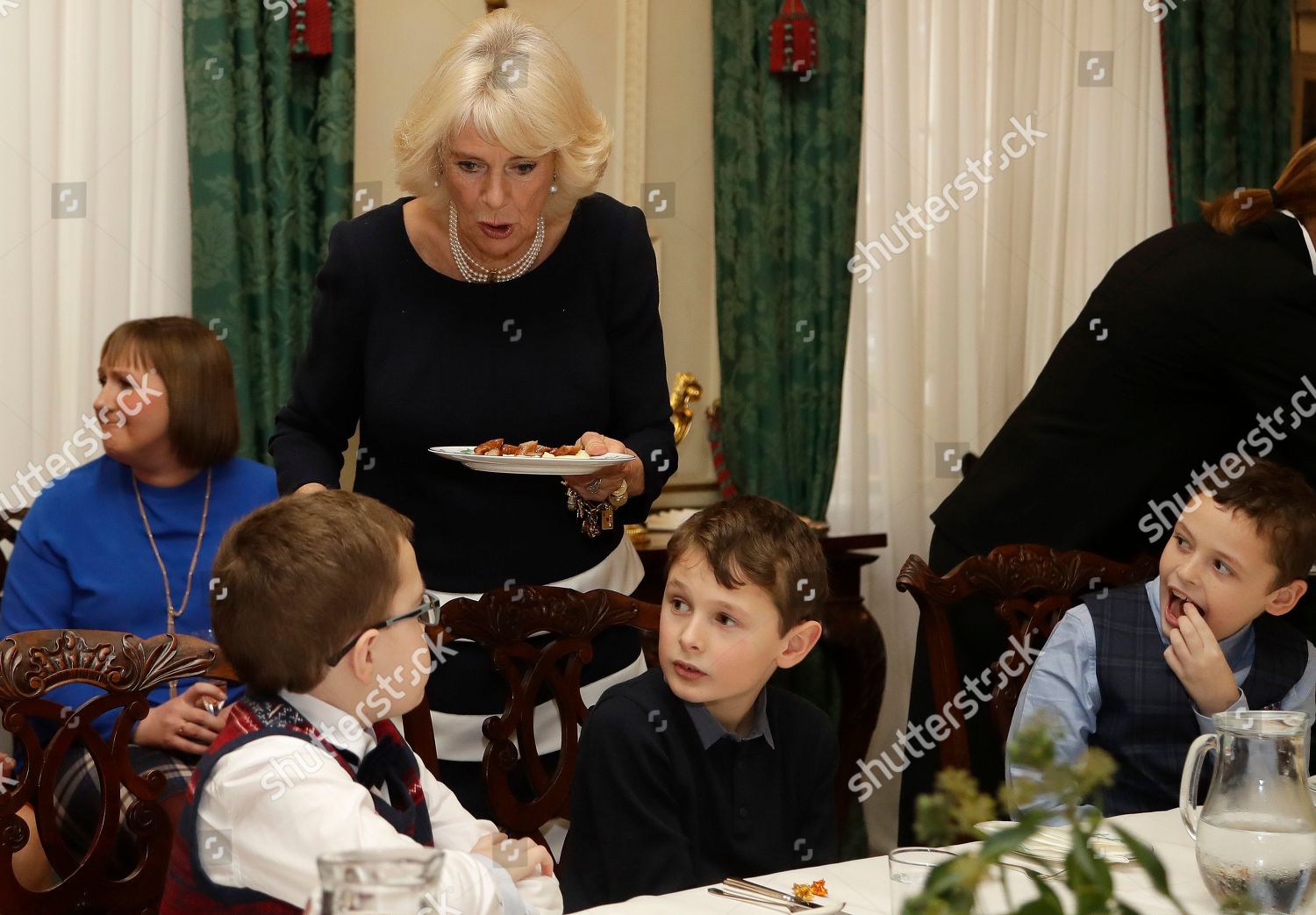 children-attend-a-christmas-event-at-clarence-house-london-uk-shutterstock-editorial-10015343f.jpg