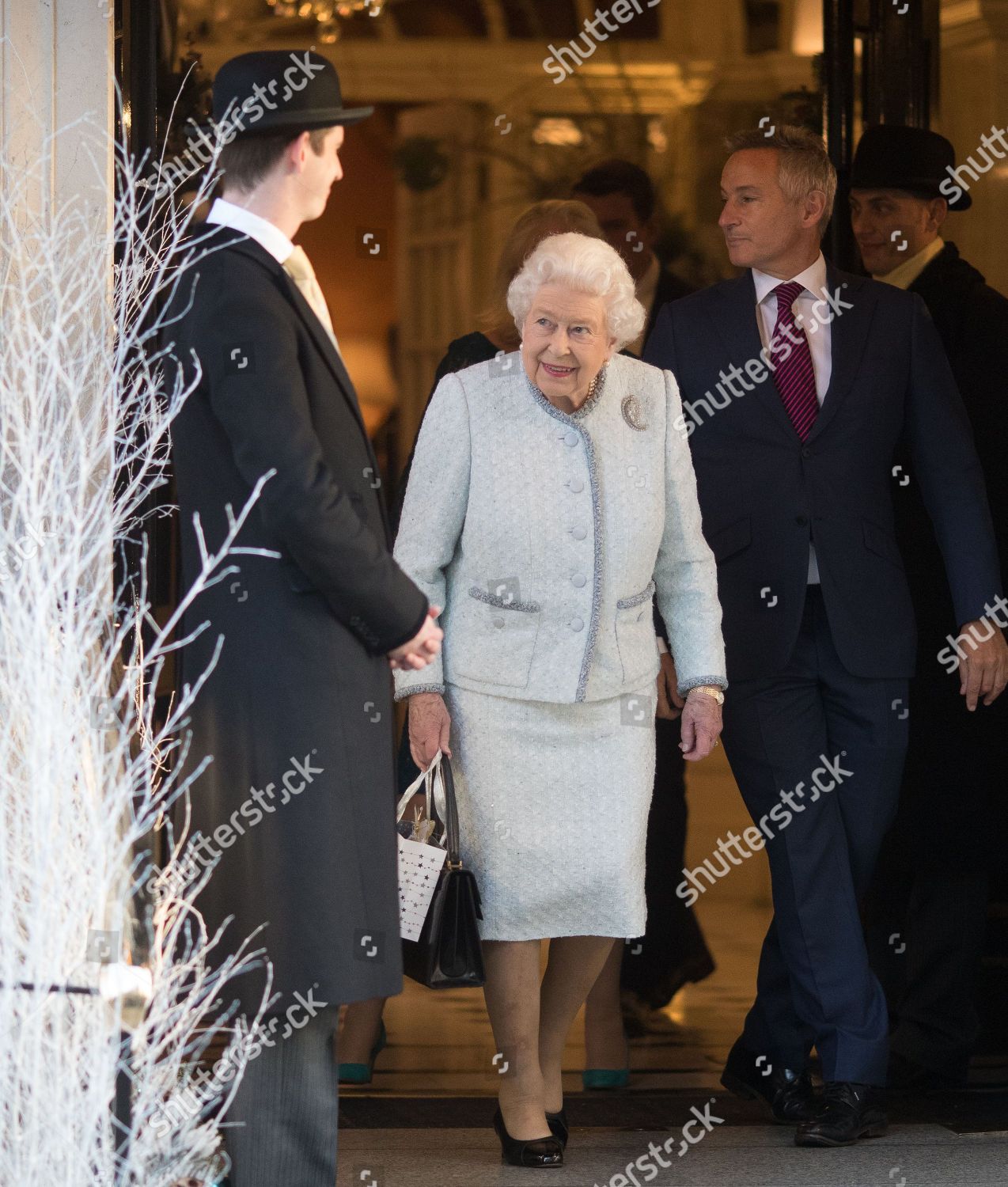 queen-elizabeth-staff-christmas-lunch-london-uk-shutterstock-editorial-10030279a.jpg