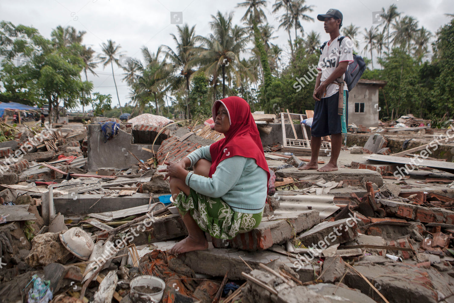 Indonesian Tsunami Victim Sits On Ruins Her Editorial Stock Photo