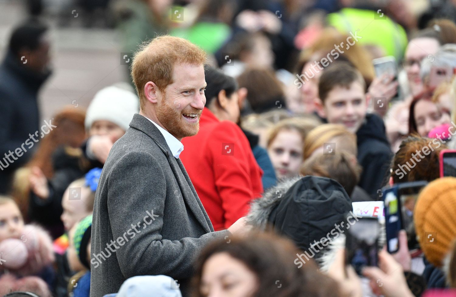 prince-harry-and-meghan-duchess-of-sussex-visit-to-birkenhead-uk-shutterstock-editorial-10056189aw.jpg