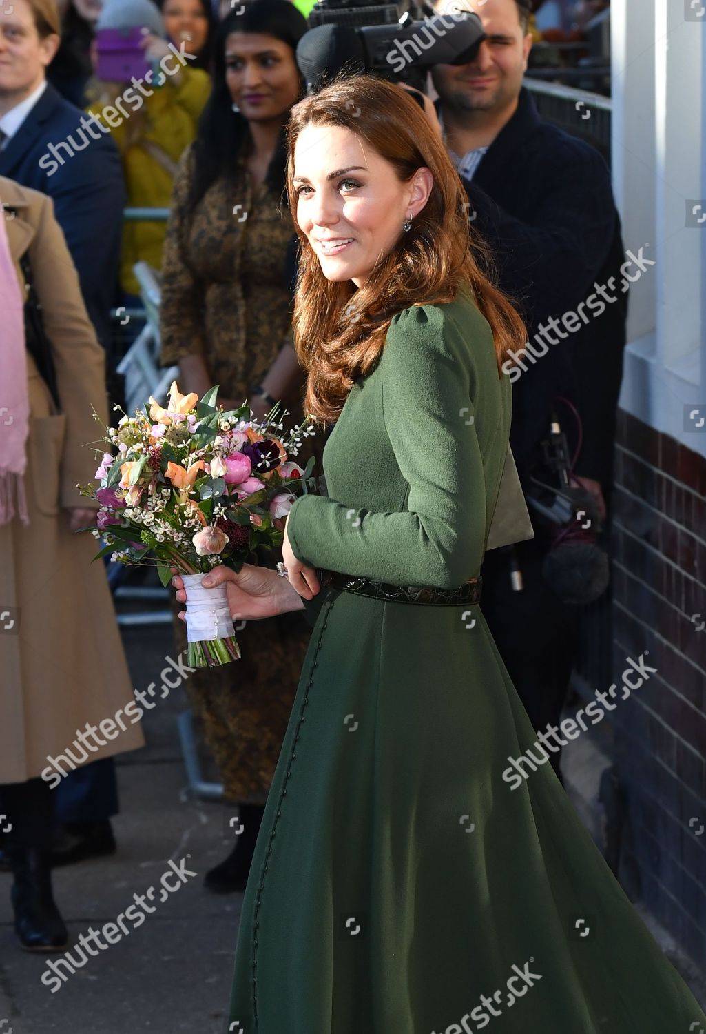 catherine-duchess-of-cambridge-visits-family-action-lewisham-london-uk-shutterstock-editorial-10070455ae.jpg