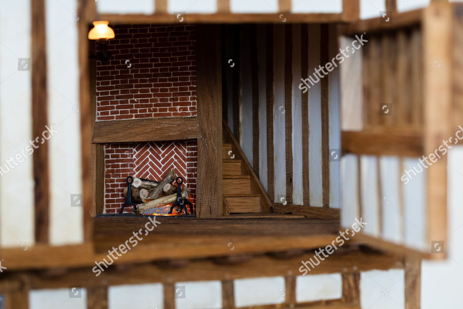 Minature Fireplace Seen Inside Dollshouse By Graham Editorial