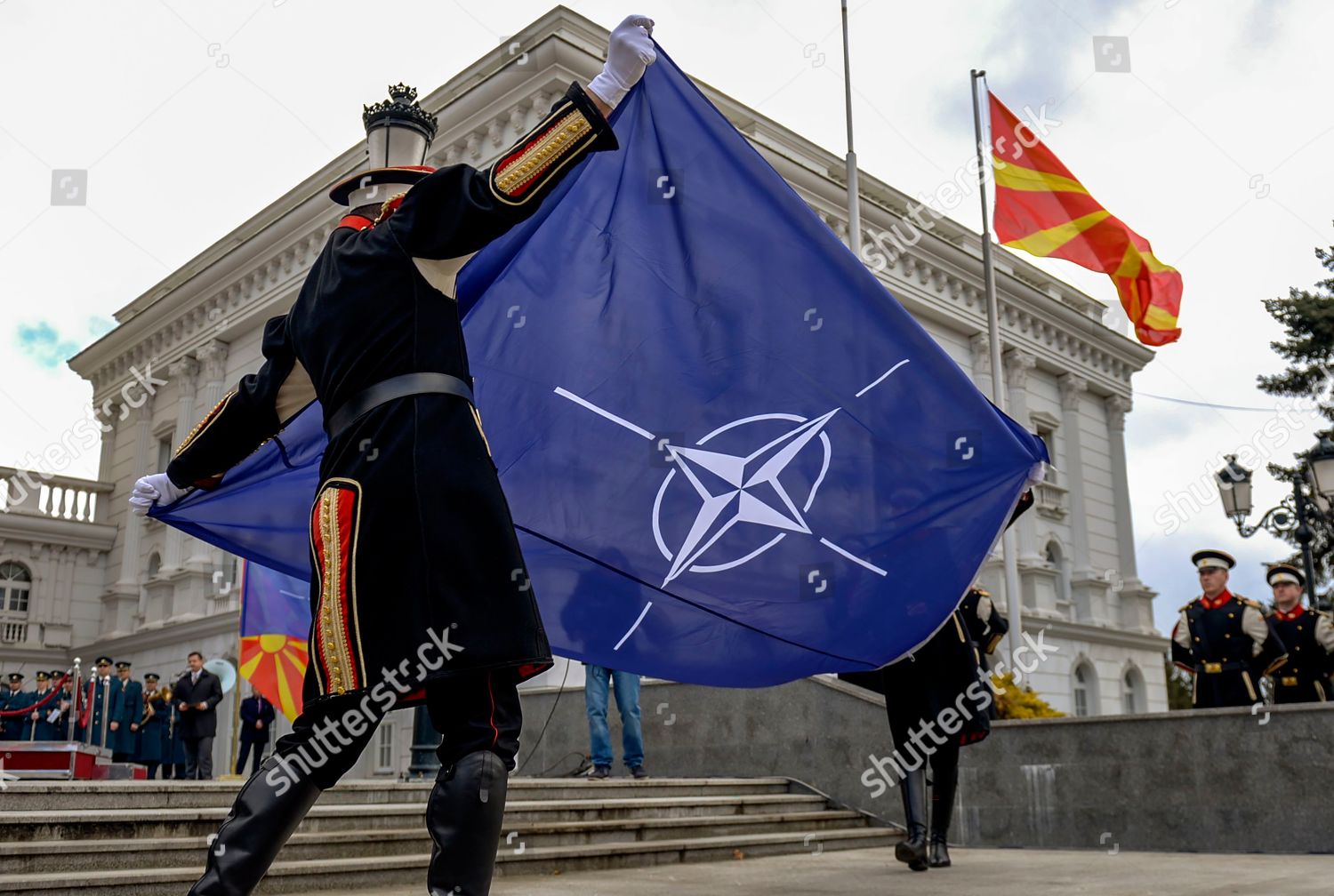 Members Honor Guard Hoist Nato Flag Alongside Foto Editorial En Stock Imagen En Stock Shutterstock