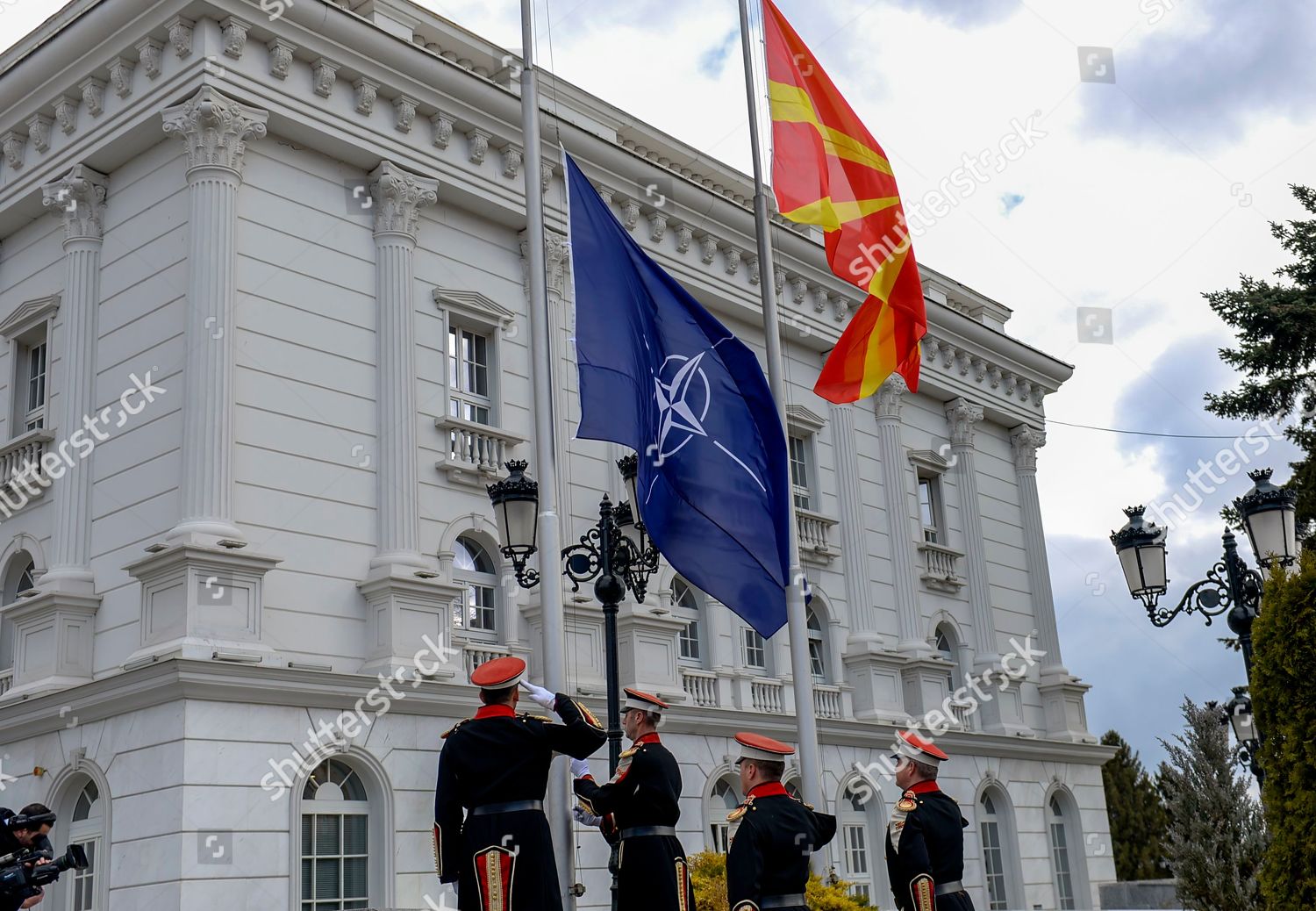 Members Honor Guard Hoist Nato Flag Alongside Foto Editorial En Stock Imagen En Stock Shutterstock