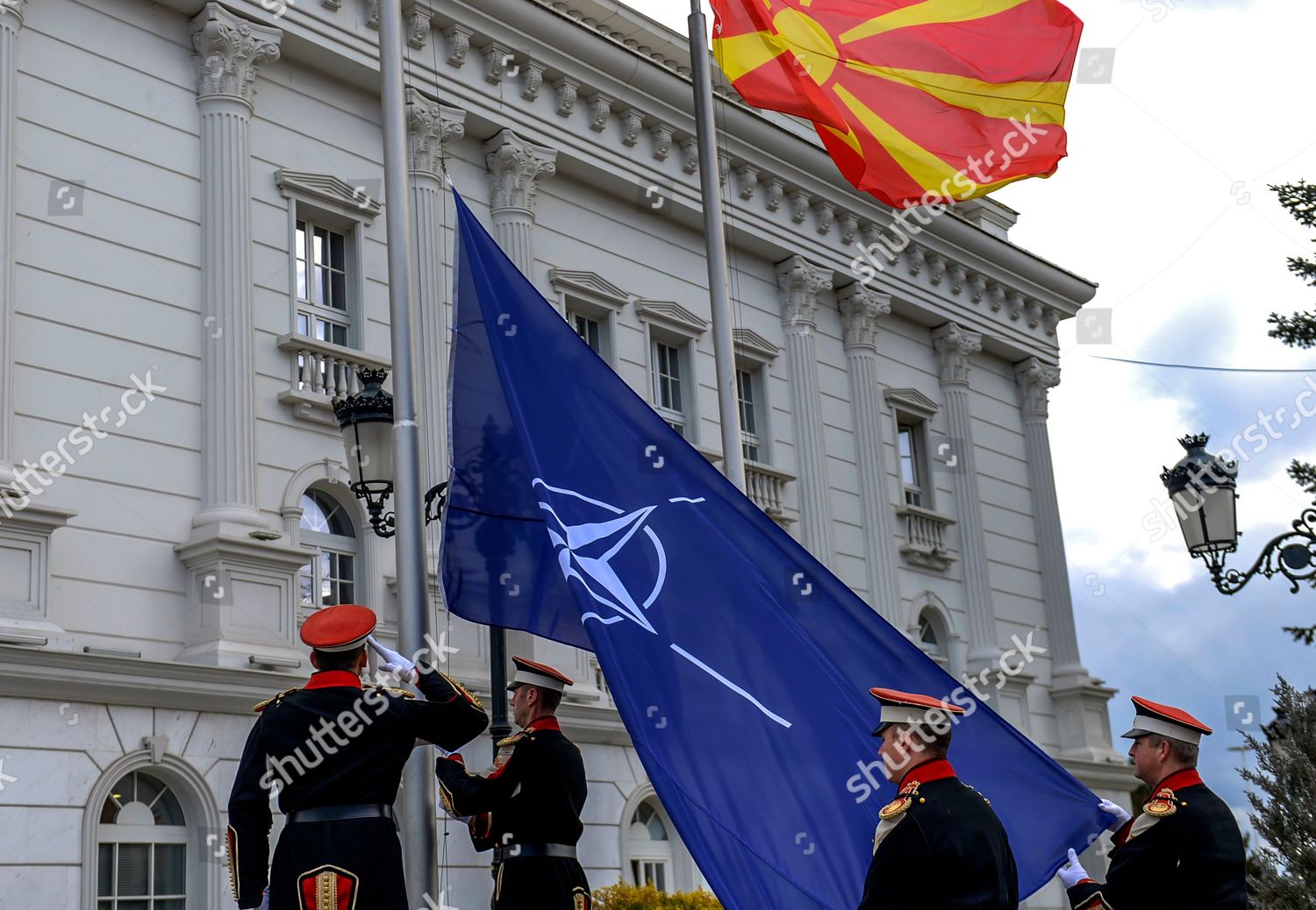 Members Honor Guard Hoist Nato Flag Alongside Foto Editorial En Stock Imagen En Stock Shutterstock