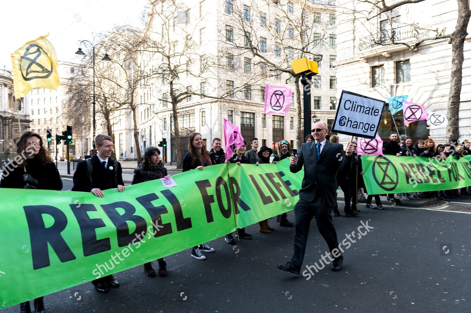 Foto stock a tema Extinction Rebellion protest at London Fashion Week, UK - 17 Feb 2019