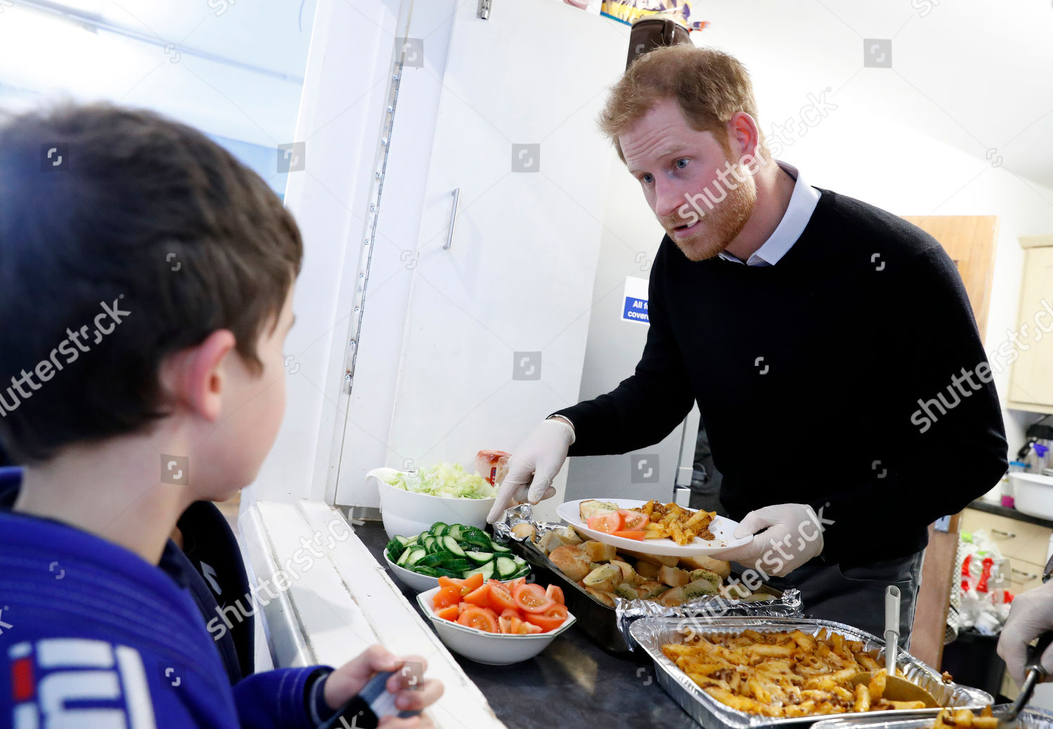 prince-harry-visit-to-fit-and-fed-half-term-initiative-streatham-london-uk-shutterstock-editorial-10110713o.jpg