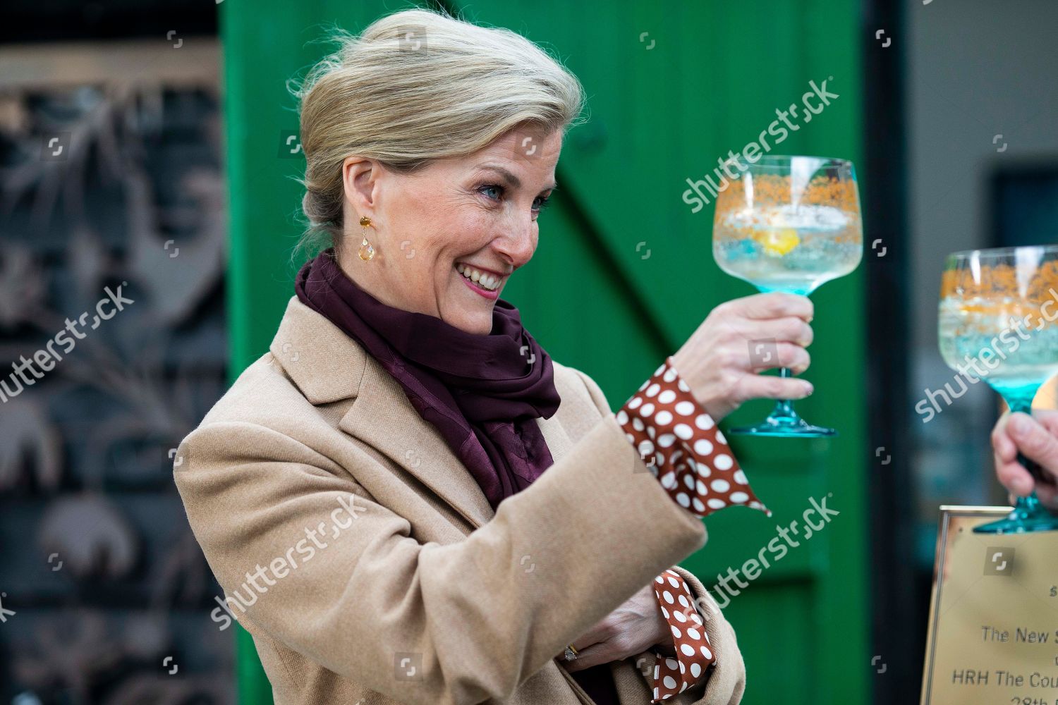 sophie-countess-of-wessex-visit-to-silent-pool-distillery-albury-uk-shutterstock-editorial-10123902at.jpg