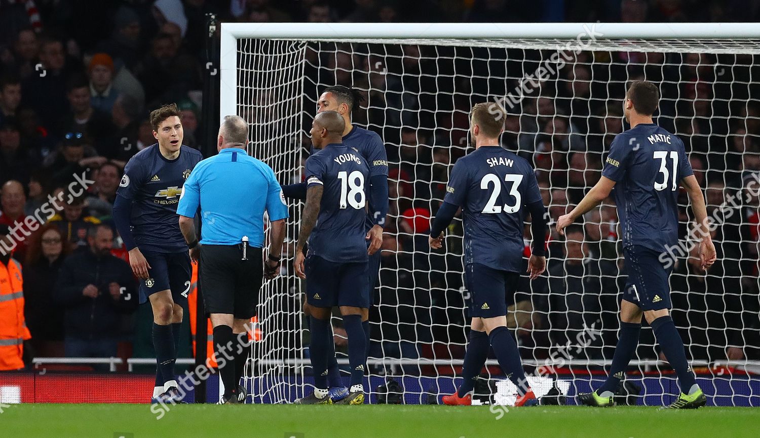 Manchester United Players Surround Referee Jon Editorial Stock Photo ...