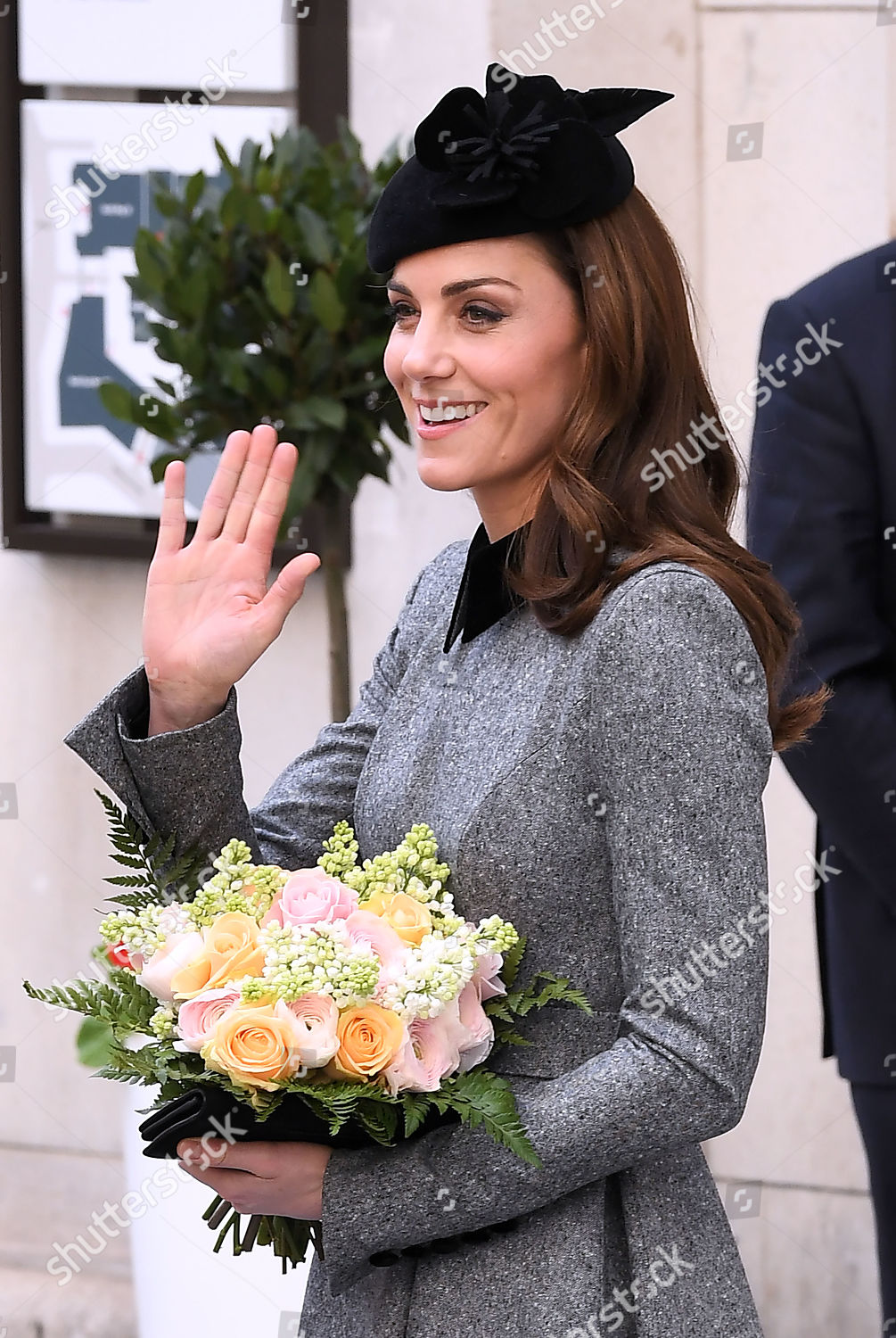 queen-elizabeth-ii-and-catherine-duchess-of-cambridge-visit-kings-college-to-open-bush-house-london-uk-shutterstock-editorial-10159785ay.jpg