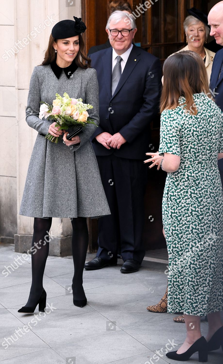 queen-elizabeth-ii-and-catherine-duchess-of-cambridge-visit-kings-college-to-open-bush-house-london-uk-shutterstock-editorial-10159785bb.jpg
