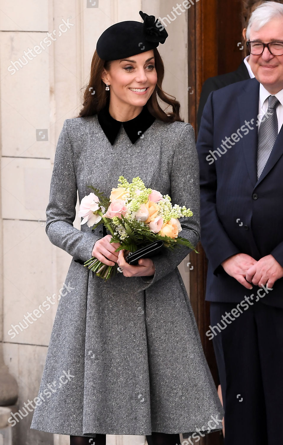 queen-elizabeth-ii-and-catherine-duchess-of-cambridge-visit-kings-college-to-open-bush-house-london-uk-shutterstock-editorial-10159785bh.jpg