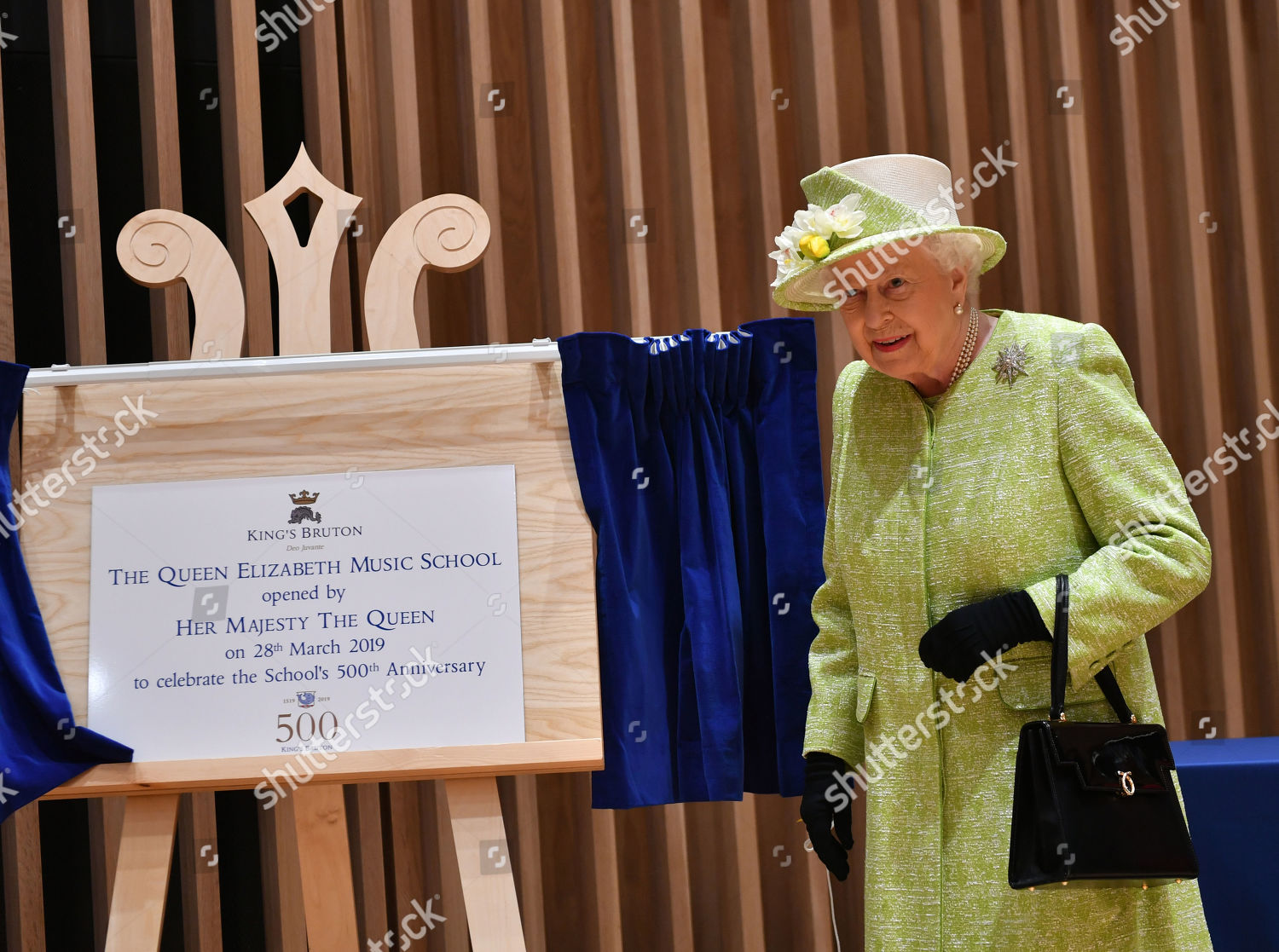 queen-elizabeth-ii-visit-to-somerset-uk-shutterstock-editorial-10180655n.jpg