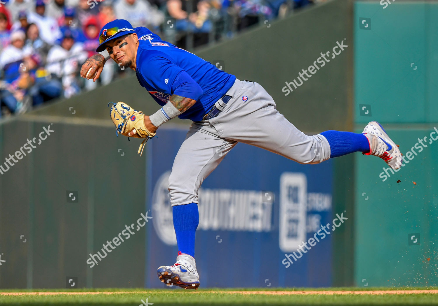 Mar 31, 2019: Chicago Cubs shortstop Javier Baez #9 jersey with the Chicago  Cubs logo at first base during an MLB game between the Chicago Cubs and the  Texas Rangers at Globe