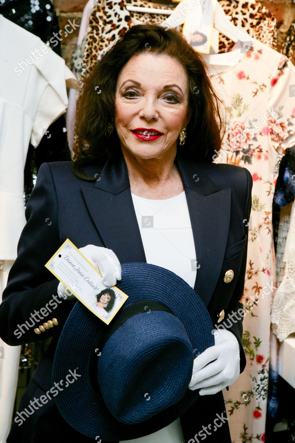 Dame Joan Collins her donated items Editorial Stock Photo - Stock Image