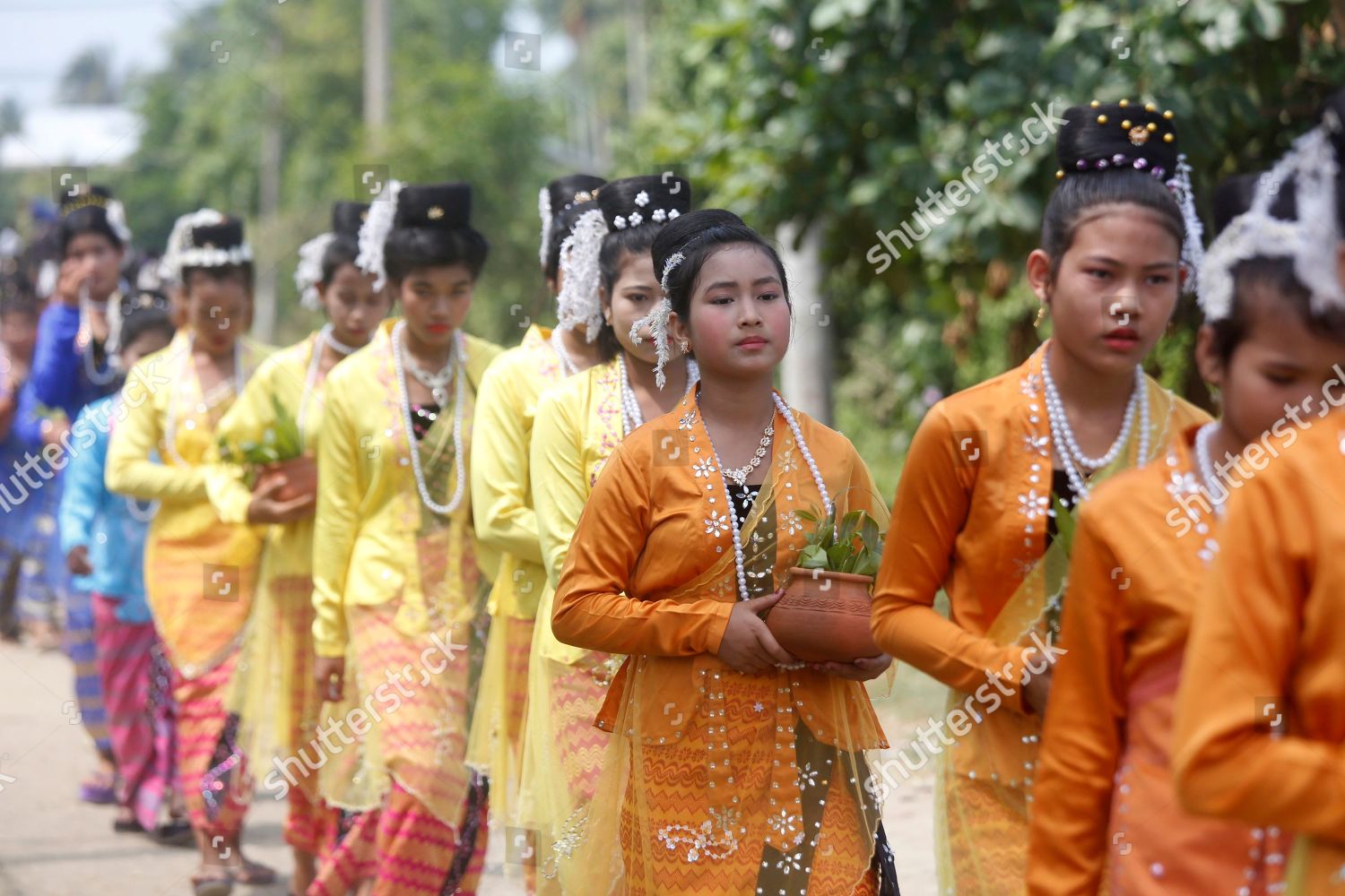 RAKHINE ETHNIC GIRLS WEARING TRADITIONAL DRESS Editorial Stock Photo