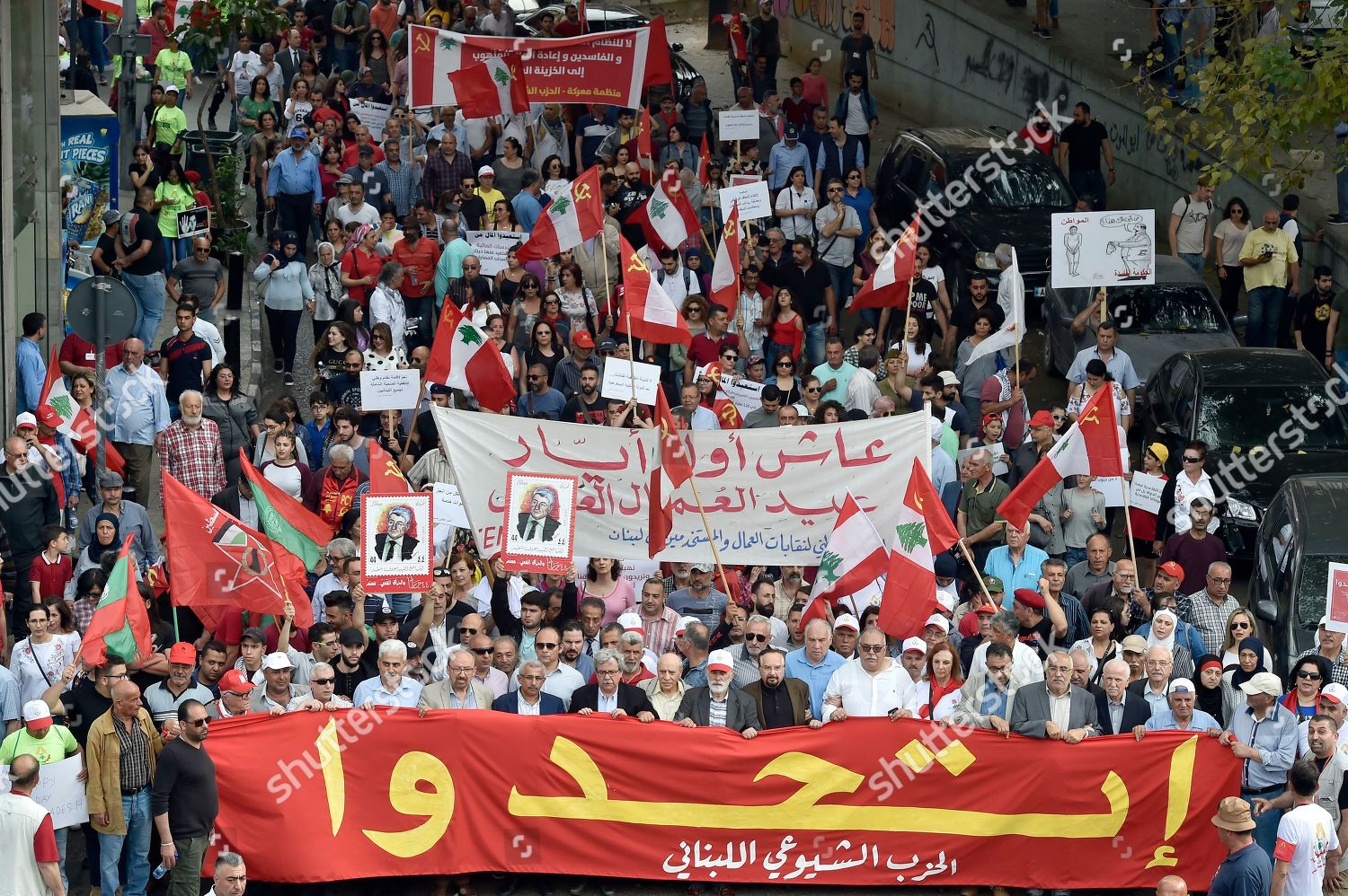 Supporters Lebanese Communist Party Carry Banner Reading Editorial