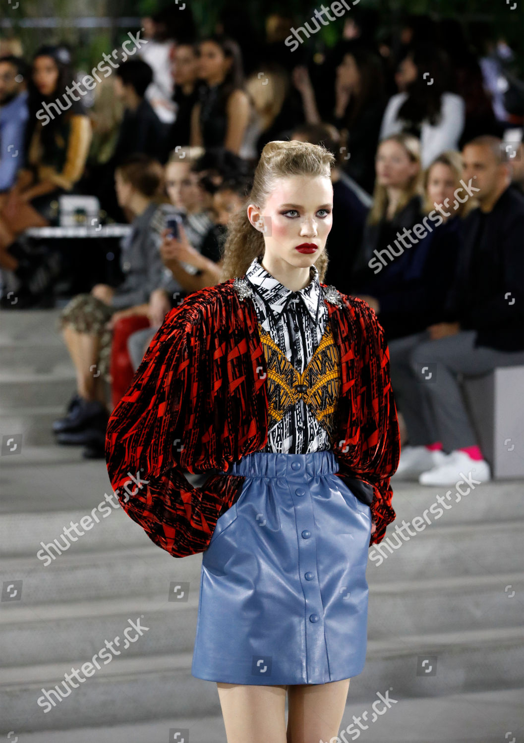 A model displays a creation by designer Nicolas Ghesquiere for