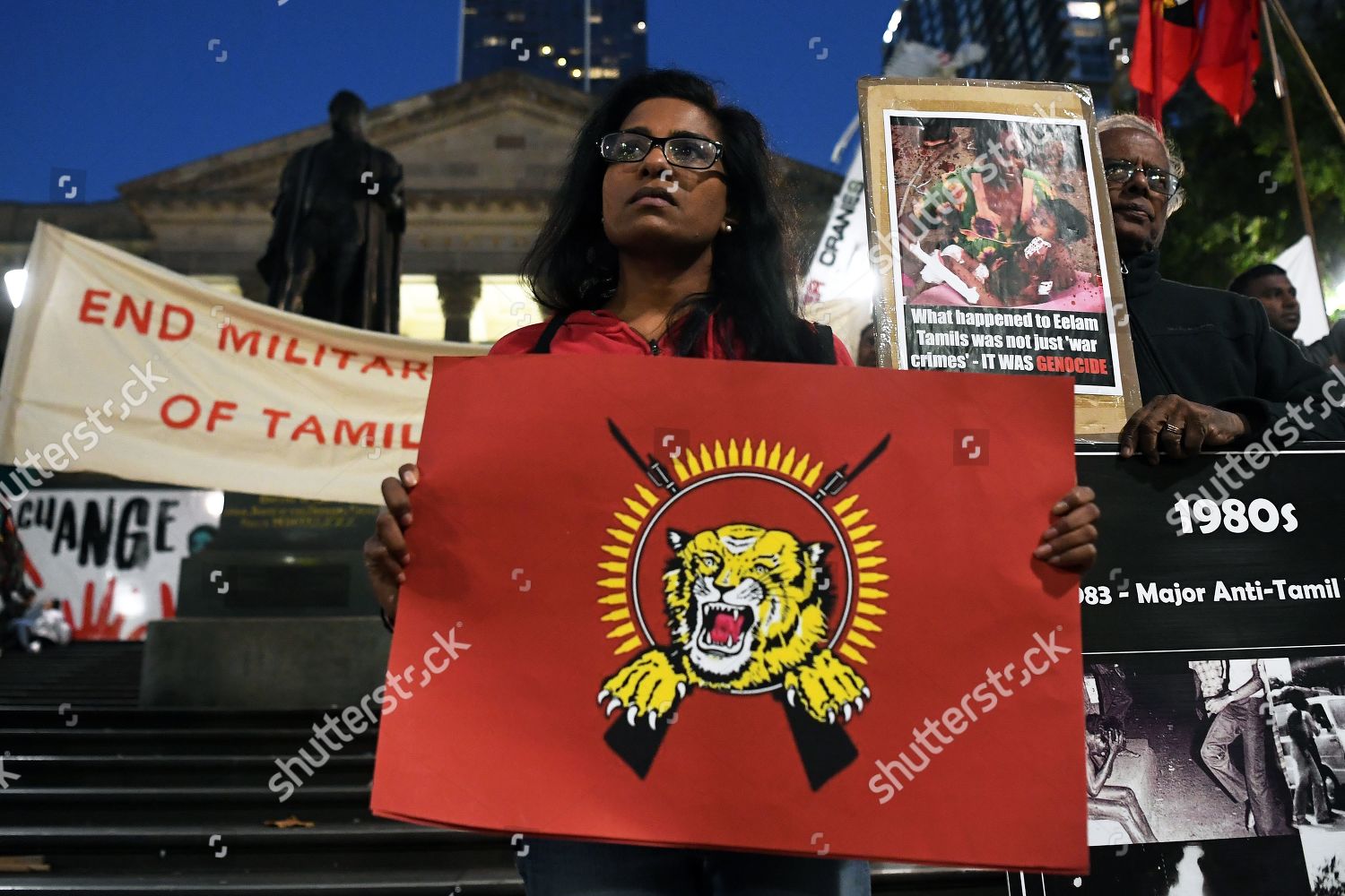 Protesters Hold Banners Flags During Demonstration Outside
