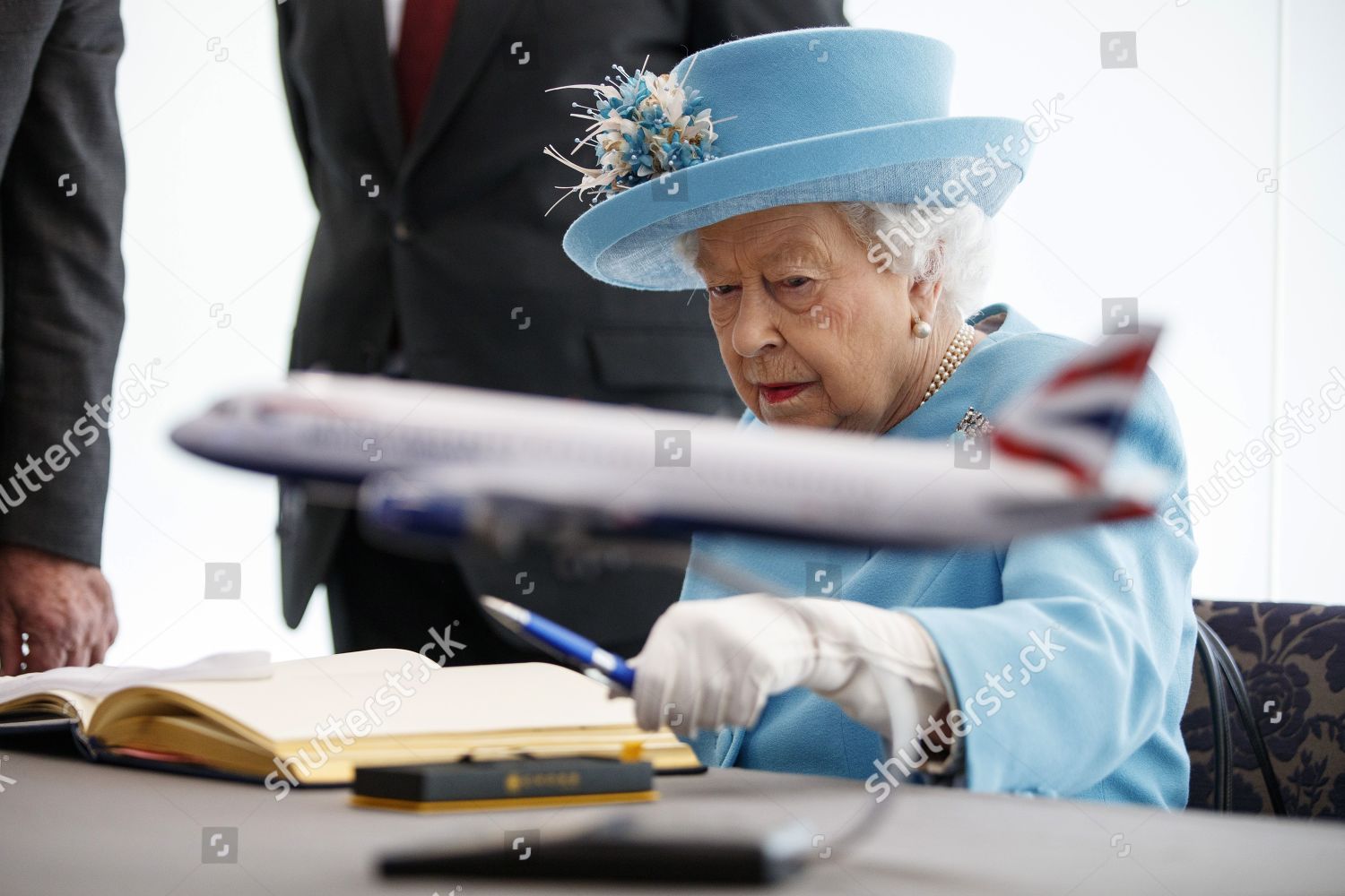 queen-elizabeth-ii-visits-british-airways-headquarters-heathrow-airport-london-uk-shutterstock-editorial-10245682n.jpg