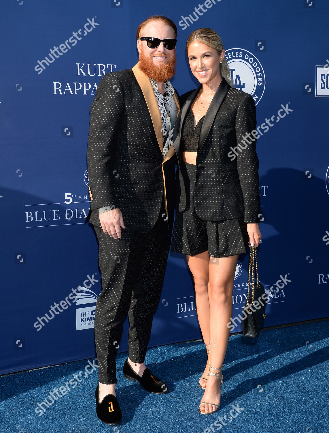Justin Turner and wife Kourtney Turner after she sang the National News  Photo - Getty Images