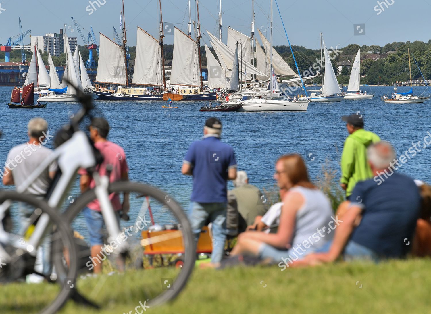 People Observe Traditional Sailing Ships During Windjammer