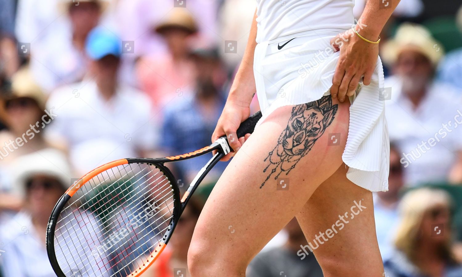A tattoo on the leg of Elina Svitolina during her Ladies' Singles semi...