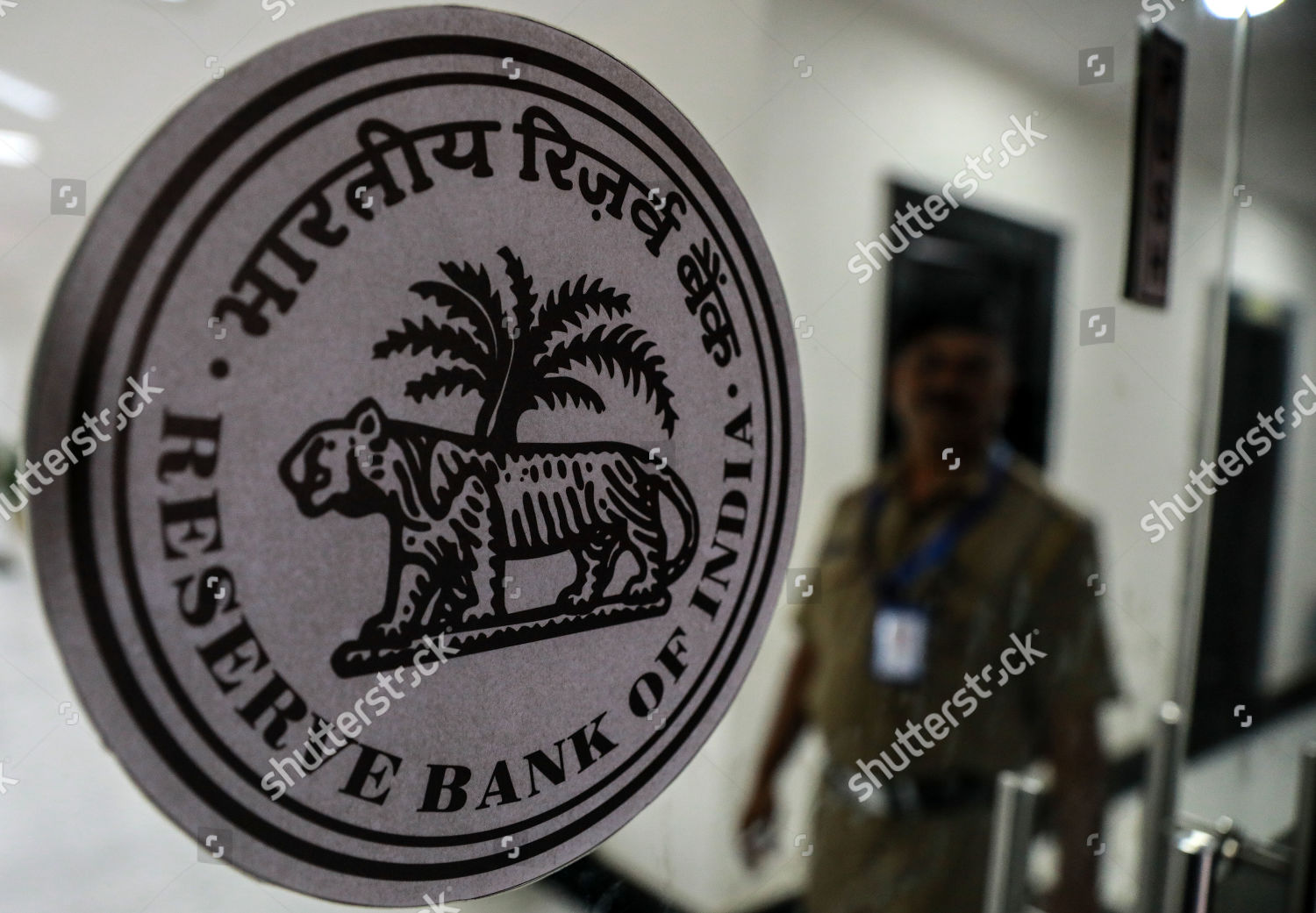 Indian Security Officer R Stands Near Logo Editorial Stock Photo