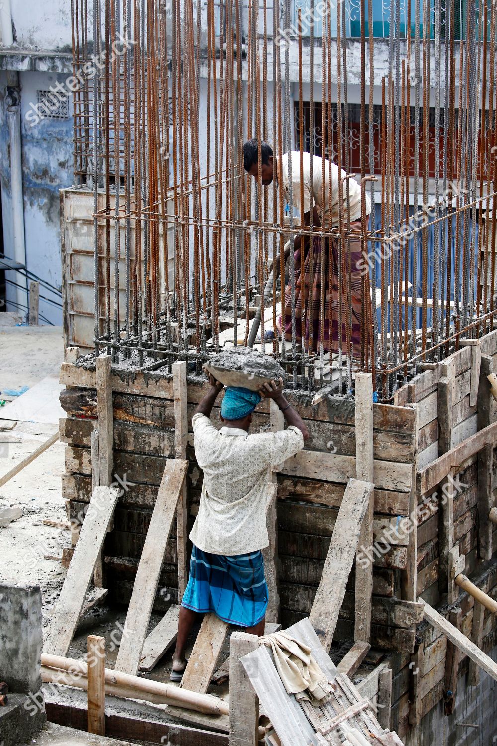 bangladeshi-laborers-work-construction-site-dhaka-editorial-stock-photo