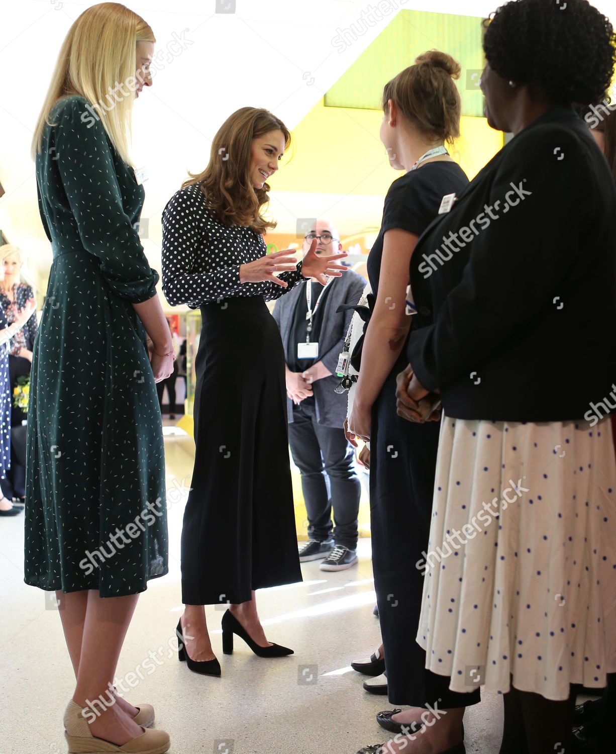 catherine-duchess-of-cambridge-visits-sunshine-house-children-and-young-peoples-health-and-development-centre-peckham-london-uk-shutterstock-editorial-10418221a.jpg