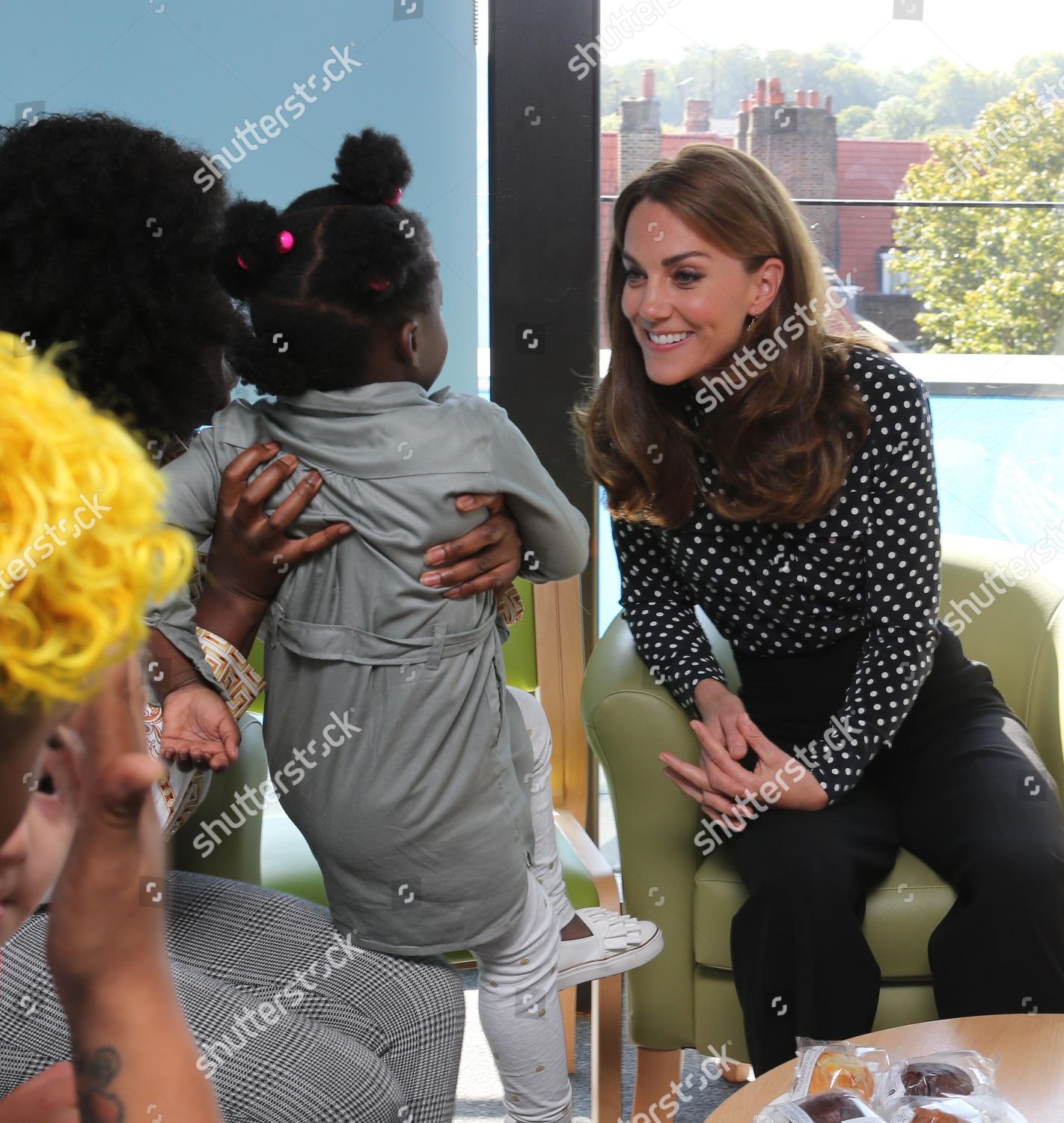 catherine-duchess-of-cambridge-visits-sunshine-house-children-and-young-peoples-health-and-development-centre-peckham-london-uk-shutterstock-editorial-10418221f.jpg
