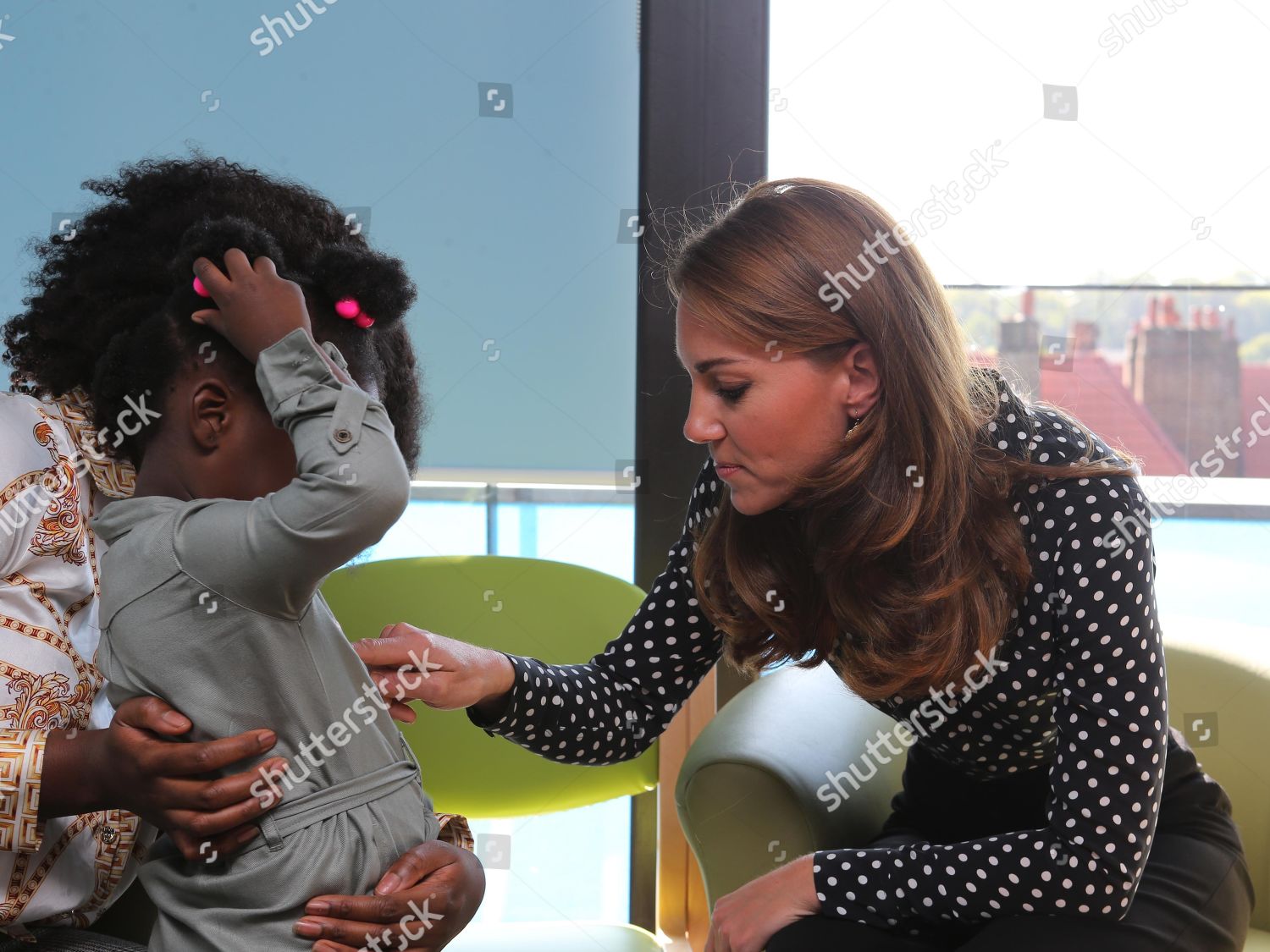 catherine-duchess-of-cambridge-visits-sunshine-house-children-and-young-peoples-health-and-development-centre-peckham-london-uk-shutterstock-editorial-10418221h.jpg