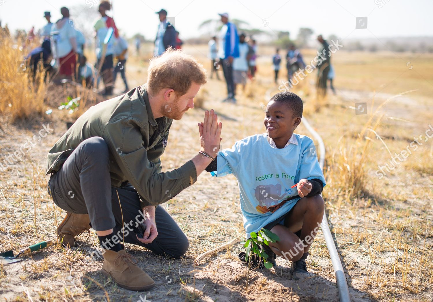 prince-harry-visit-to-africa-shutterstock-editorial-10424667ai.jpg