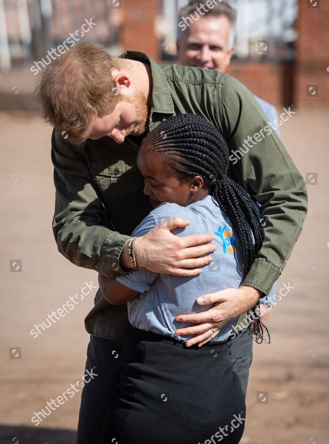 prince-harry-visit-to-africa-shutterstock-editorial-10424667am.jpg