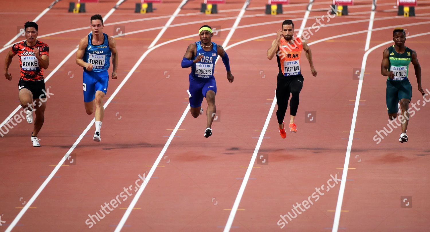 ATHLETES ACTION DURING MEN'S 100M HEATS Editorial Stock Photo - Stock ...