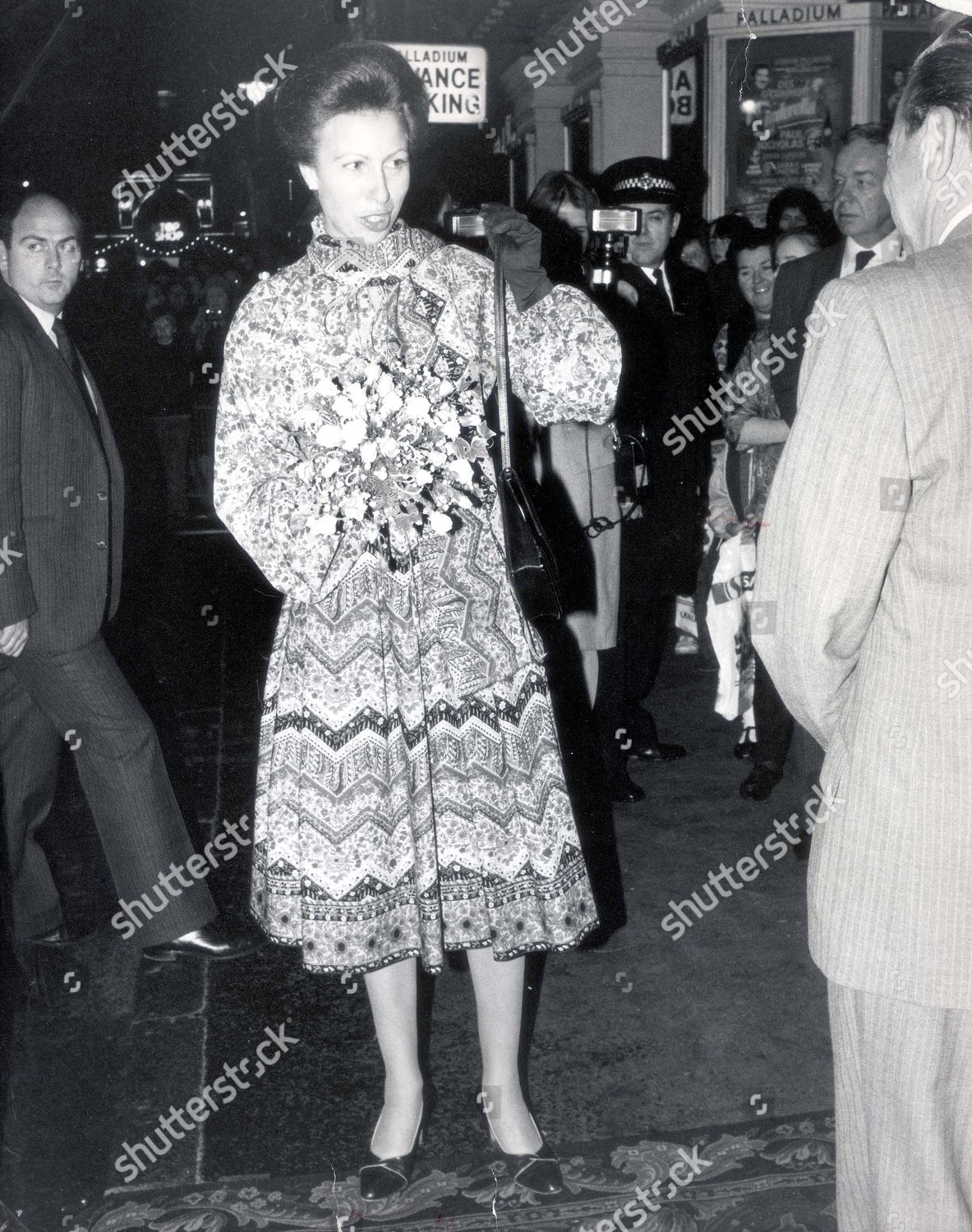 princess-royal-december-1985-princess-anne-leaves-palladium-after-seeing-cinderella-with-her-two-children-peter-and-zara-royalty-shutterstock-editorial-1044121a.jpg