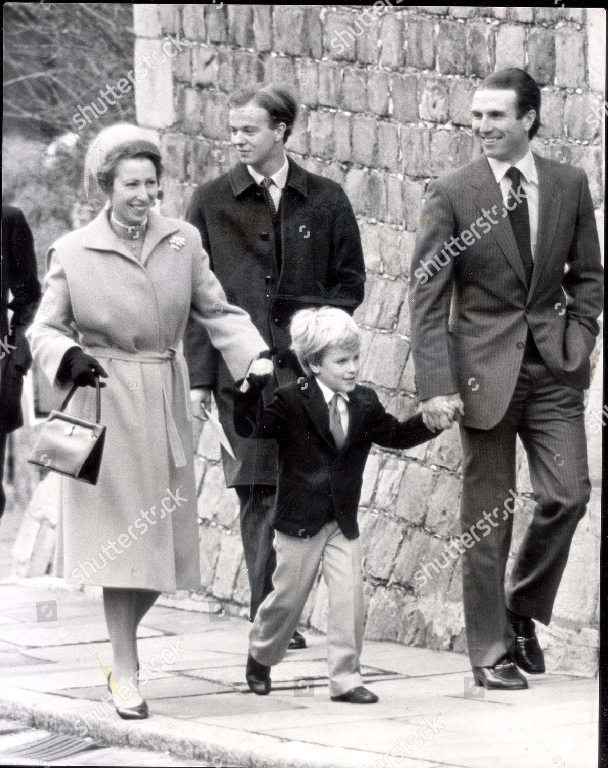 peter-phillips-december-1983-the-royal-family-attend-st-georges-chapel-at-windsor-castle-on-christmas-day-morning-our-pictures-show-captain-mark-phillips-with-his-son-peter-phillips-and-princess-anne-shutterstock-editorial-1044143a.jpg